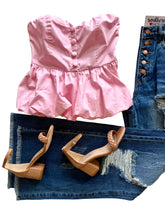 The Strapless Peplum Top