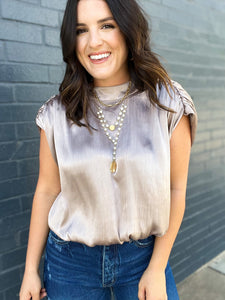 The Proper Top